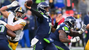 Geno Smith Quarterback Action Seahawks Wallpaper