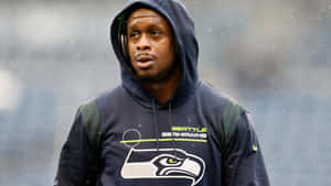 Geno Smith Seattle Seahawks Contemplative Moment Wallpaper