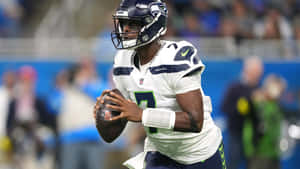 Geno Smith Seattle Seahawks Quarterback Action Wallpaper