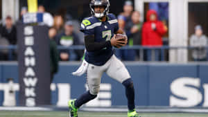 Geno Smith Seattle Seahawks Quarterback Action Wallpaper