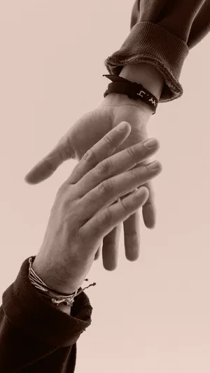 Gentle Handshake With Bracelets Wallpaper