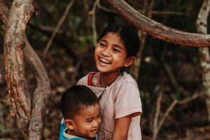 Genuine Happiness Of Poor Kids Wallpaper