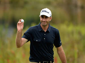 Geoff Ogilvy Holding Golf Ball Wallpaper