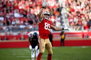 George Kittle Catching A Pass Wallpaper