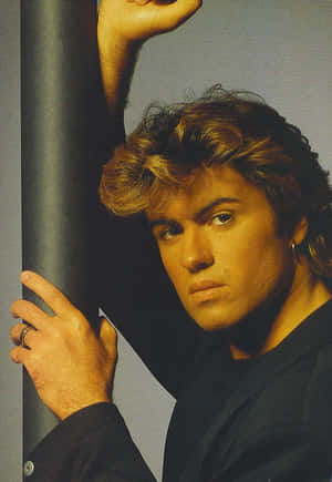 George Michael In One Of His Legendary Music Videos Wallpaper