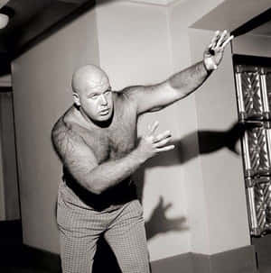 George Steele Extending Hand Pose Wallpaper