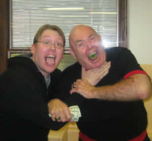 George Steele Posing With A Fan Wallpaper
