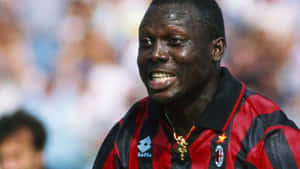 George Weah In Action For Ac Milan Wallpaper