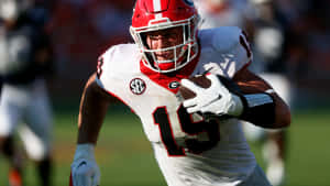 Georgia Bulldogs Football Player Action Shot Wallpaper