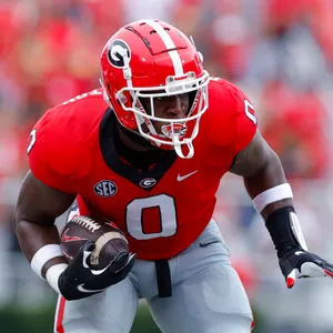 Georgia Football Player In Action Wallpaper