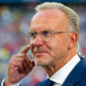 German Football Executive Karl-heinz Rummenigge Side Angle Shot Wallpaper