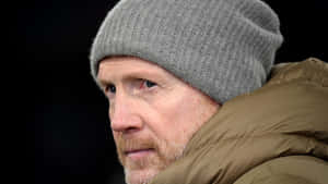 German Football Official Matthias Sammer Wearing A Beanie Wallpaper