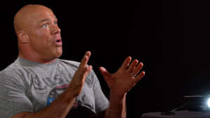 Gesturing Kurt Angle Wwe Photoshoot Wallpaper