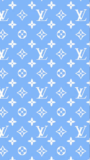 Get A Glimpse Of Timeless Luxury With This Gorgeous Blue Louis Vuitton Pattern Wallpaper