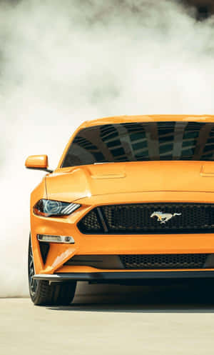 Get Behind The Wheel Of Style With The Mustang Iphone Wallpaper