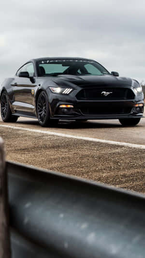 Get Behind The Wheel Of Your Dream Car With The Mustang Iphone Wallpaper