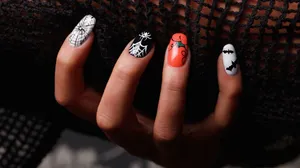 Get Creative With Eerie Halloween Nail Art Wallpaper