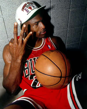 Get One Of The Greatest Athletes Of All-time On Your Phone With The Michael Jordan Iphone Wallpaper