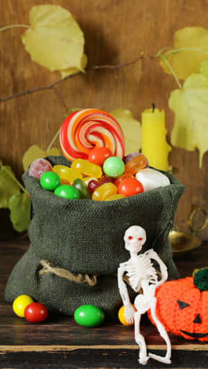 Get Ready For A Spooktacular Night Of Trick-or-treating With These Creative And Colorful Treat Bags! Wallpaper