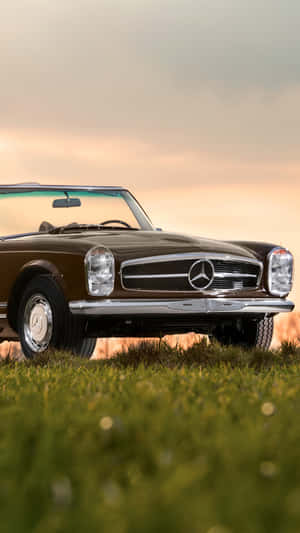 Get Ready To Cruise In Style With This Vintage Car Iphone Wallpaper