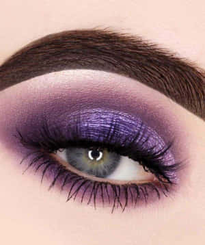 Get Ready To Turn Heads With A Pop Of Purple Eye Shadow Wallpaper