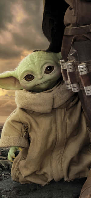 Get The Baby Yoda Phone Today And Experience The Power Of The Force! Wallpaper