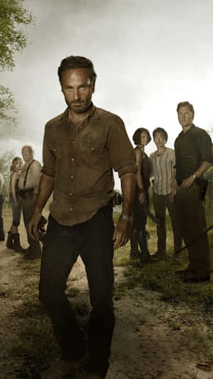 Get The Zombie Apocalypse Look For Your Iphone With The Walking Dead Wallpaper. Wallpaper