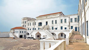 Ghana Cape Coast Castle At Sunset Wallpaper