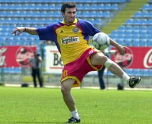 Gheorghe Hagi Exhibiting His Skills During The Euro 2000 Championship. Wallpaper