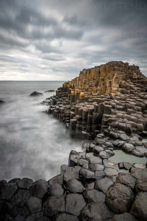 Giant's Causeway Dark Clouds Wallpaper