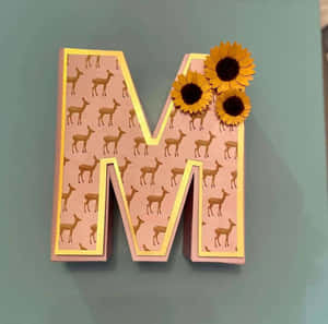 Giraffe Pattern Letter Mwith Sunflowers Wallpaper