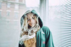 Girl In Hoodie Smoking Wallpaper