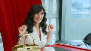 Girl In Unorthodox Red Chair Wallpaper