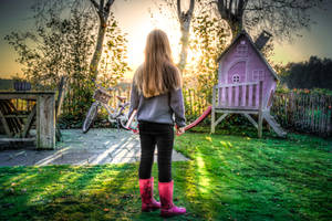 Girl On Backyard Playground Wallpaper