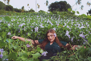 Girl On Flowers Antigua And Barbuda Wallpaper