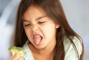Girl Reluctant To Eat Broccoli Wallpaper