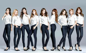 Girls Generation Group Photoin White Shirtsand Jeans Wallpaper