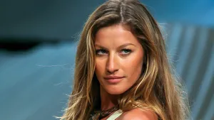 Gisele Bundchen Striking A Pose During A Fashion Shoot Wallpaper