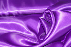 Glamorous And Sophisticated: Transform Your Home With This Stunning Purple Satin Wallpaper Wallpaper