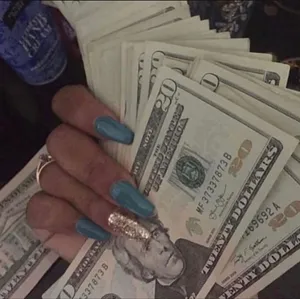 Glamorous Nails Holding Cash.jpg Wallpaper