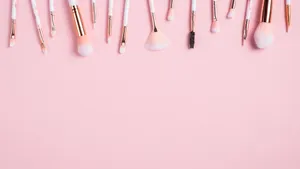 Glamorous Pink Makeup Look With Pink Eyeshadows And Lipstick Wallpaper