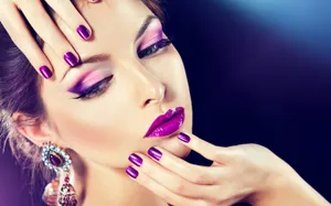 Glamorous Purple Makeupand Nail Art Wallpaper