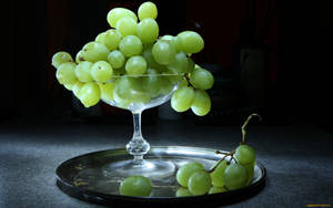 Glass Bowl Of Green Grapes Wallpaper