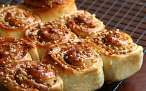 Glazed Cinnamon Rollswith Nuts Wallpaper