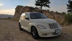 Gleaming Chrysler Pt Cruiser On The Road Wallpaper