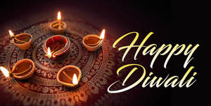 Gleaming Diyas - Enlightening The Spirit Of Diwali Wallpaper