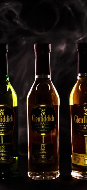 Glenfiddich Whiskies In Dim Lighting Wallpaper