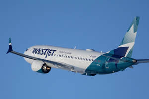 Gliding Westjet Airline Plane Wallpaper