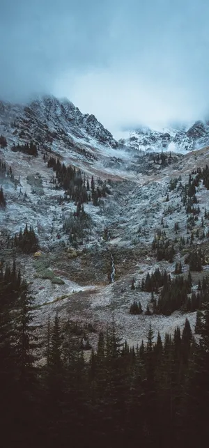Glorious Top Of A Snow Mountain Wallpaper