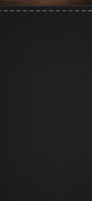 Glossy Black Leather Fabric That Shines As It Catches The Light Wallpaper